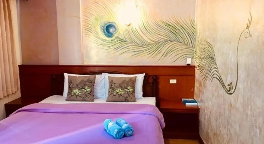 Bed in Loei Orchid Hotel