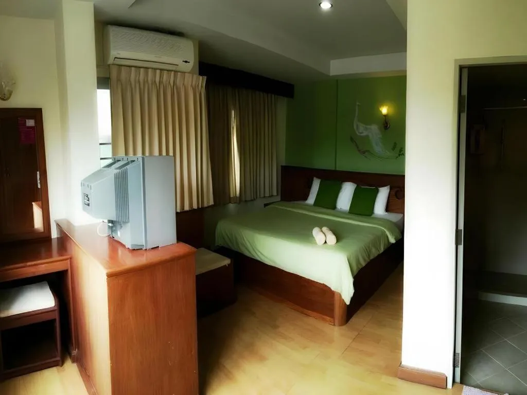 Bed in Loei Orchid Hotel
