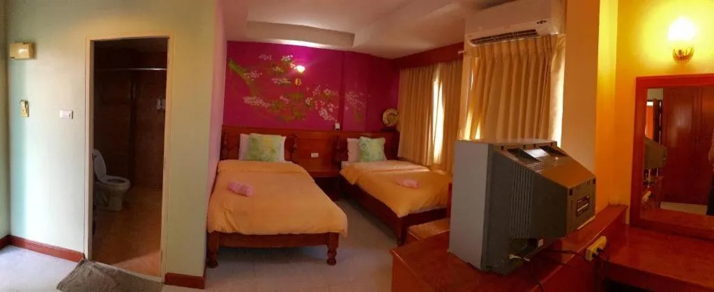 Bed in Loei Orchid Hotel