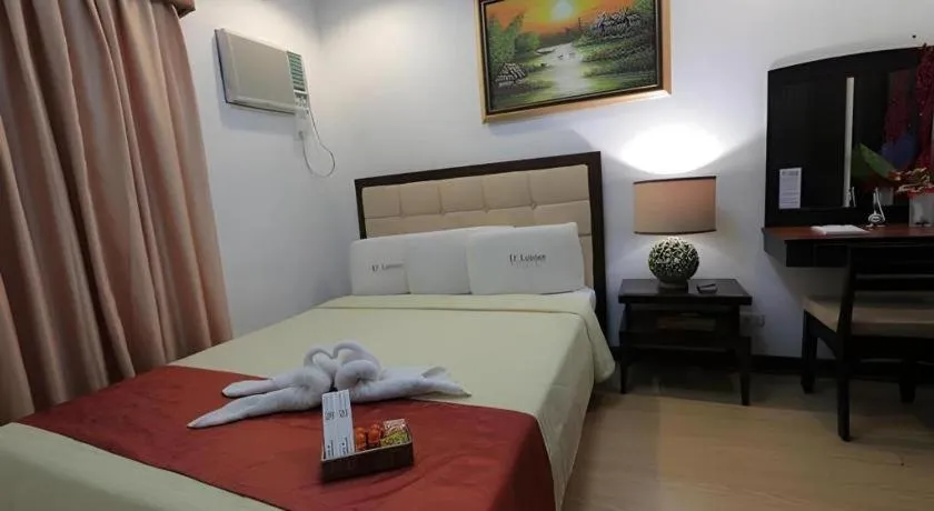 Bed in D' Leonor Hotel