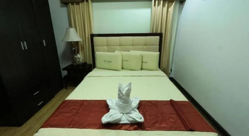 Bed in D' Leonor Hotel