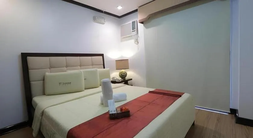 Bed in D' Leonor Hotel