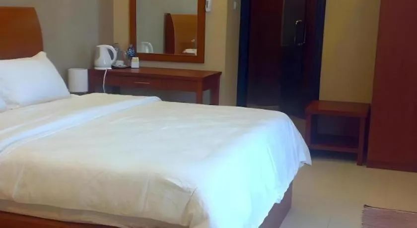 Bed in Hotel Minahasa