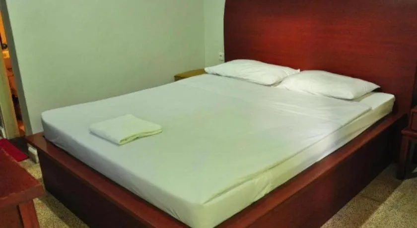 Bed in Hotel Minahasa