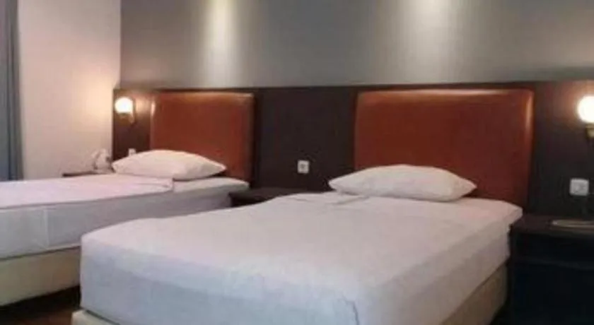 Bed in Hotel Minahasa