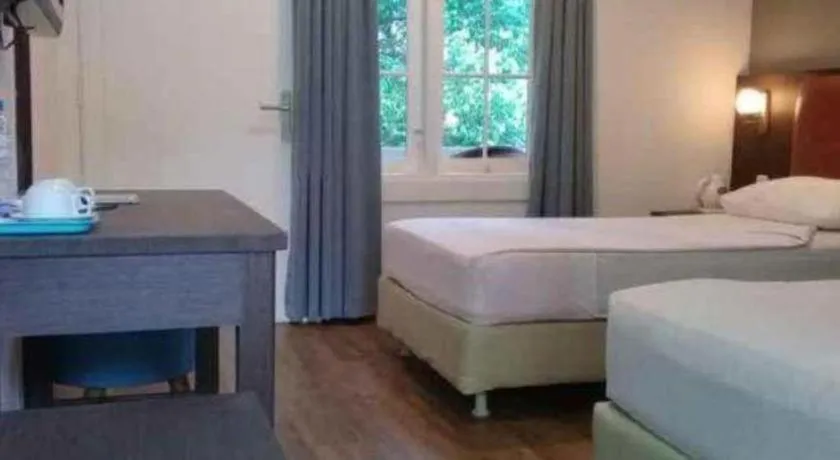 Bed in Hotel Minahasa