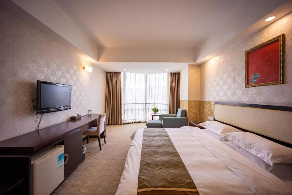 Bed in Wuhan Newport International Hotel