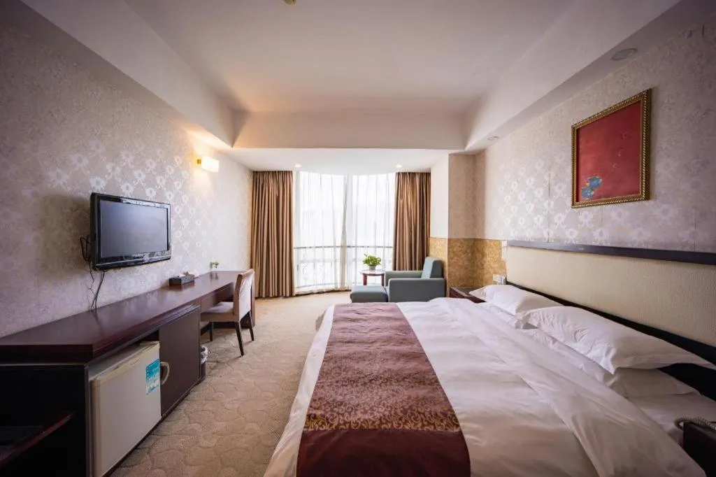 Bed in Wuhan Newport International Hotel