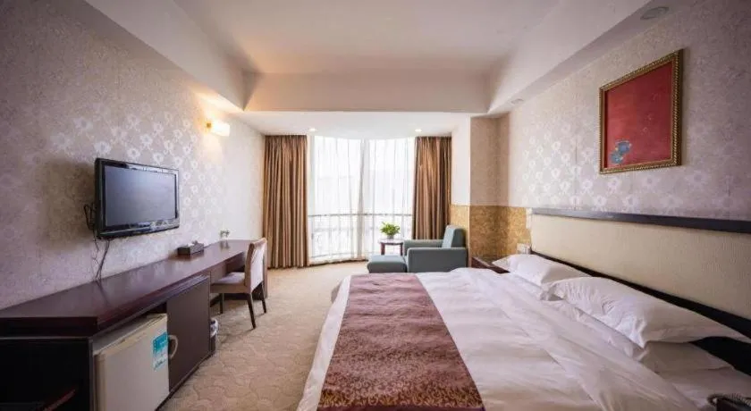 Bed in Wuhan Newport International Hotel