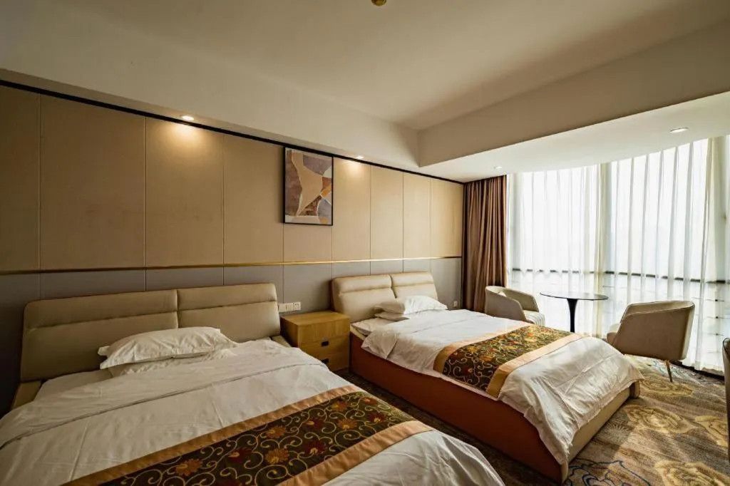 Bed in Wuhan Newport International Hotel