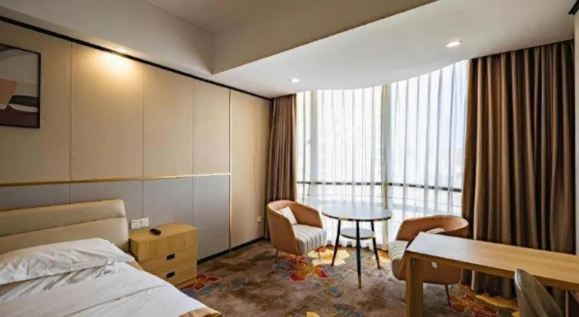 Bed in Wuhan Newport International Hotel