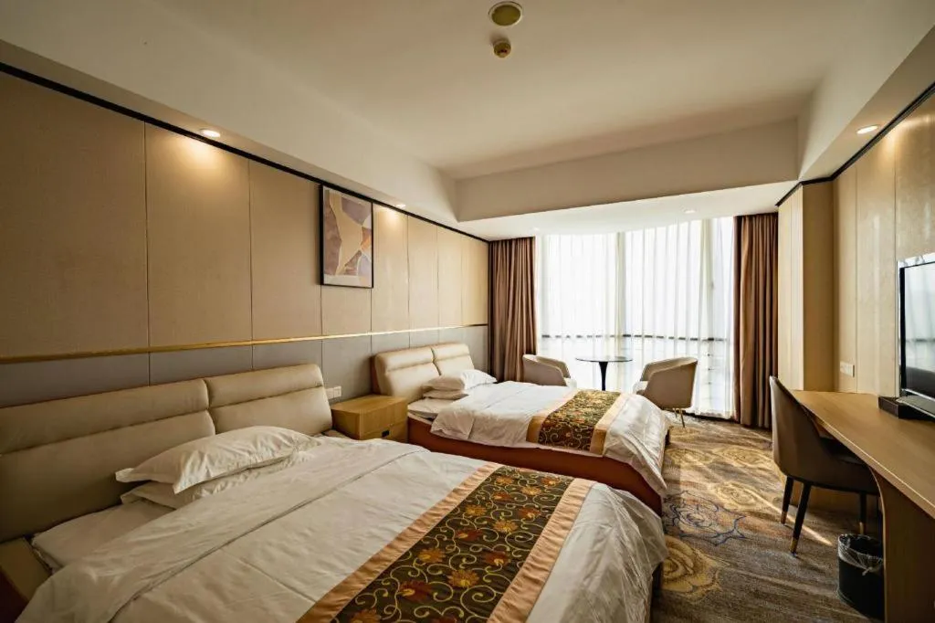 Bed in Wuhan Newport International Hotel