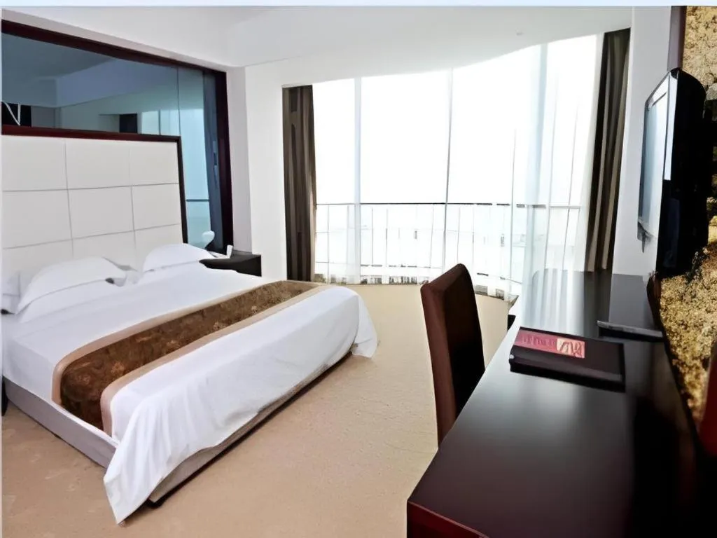 Bed in Wuhan Newport International Hotel