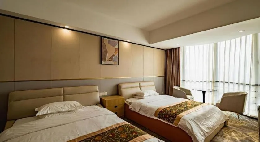 Bed in Wuhan Newport International Hotel