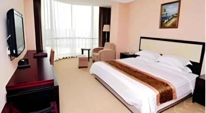 Bed in Wuhan Newport International Hotel