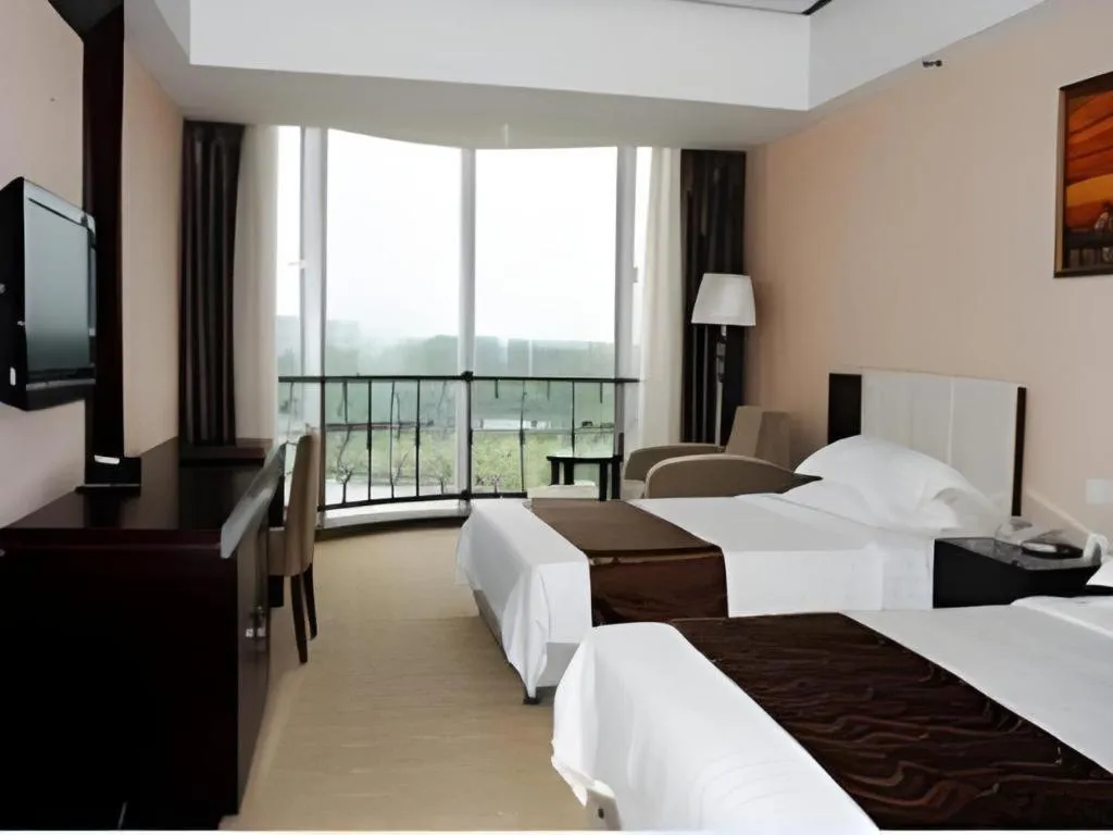 Bed in Wuhan Newport International Hotel