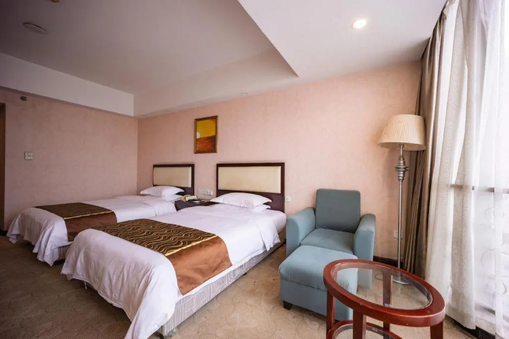 Bed in Wuhan Newport International Hotel