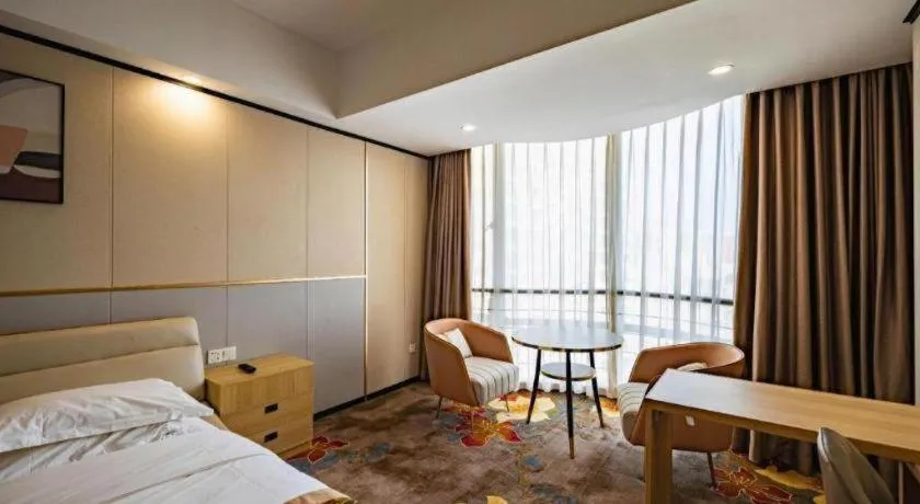 Bed in Wuhan Newport International Hotel