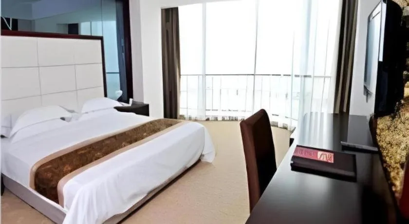 Bed in Wuhan Newport International Hotel