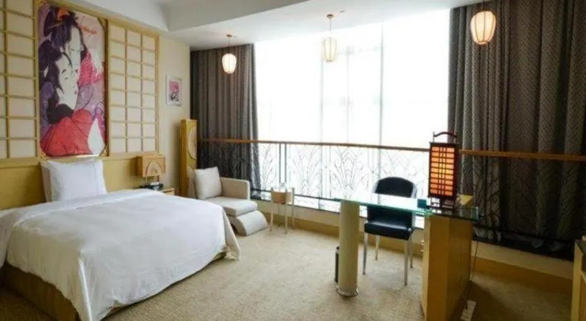 Bed in Dongguan Castfast Hotel