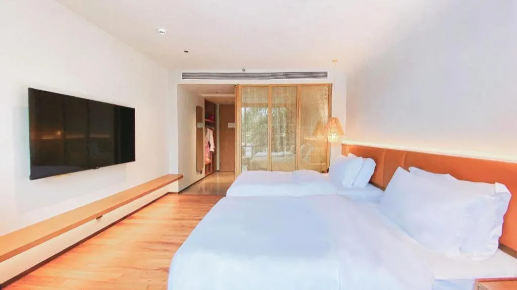 Bed in Dongguan Castfast Hotel