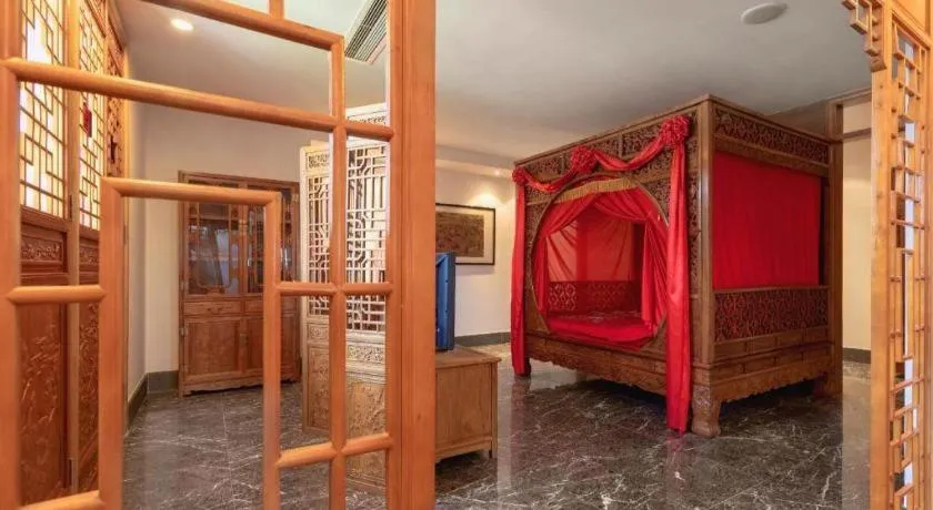 Bed in Dongguan Castfast Hotel