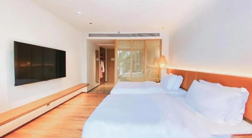 Bed in Dongguan Castfast Hotel