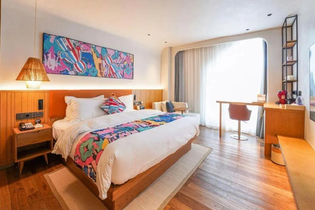 Bed in Dongguan Castfast Hotel