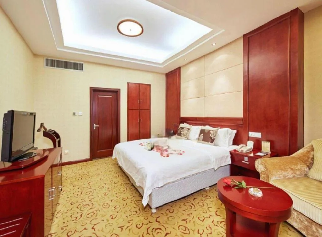 Bed in Qingdao Chengyang Detai Hotel