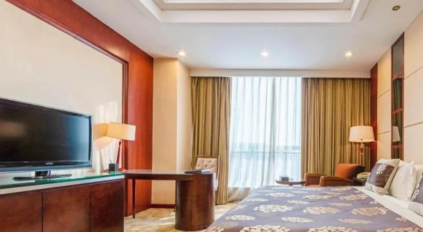 Bed in Qingdao Chengyang Detai Hotel