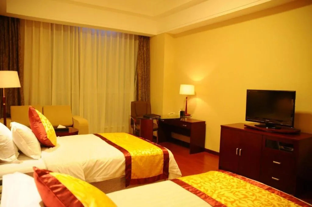 Bed in Qingdao Chengyang Detai Hotel