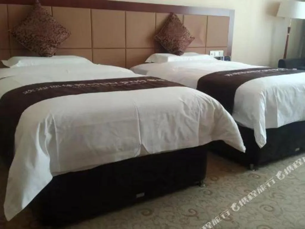 Bed in Qingdao Chengyang Detai Hotel