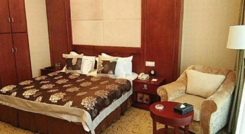 Bed in Qingdao Chengyang Detai Hotel