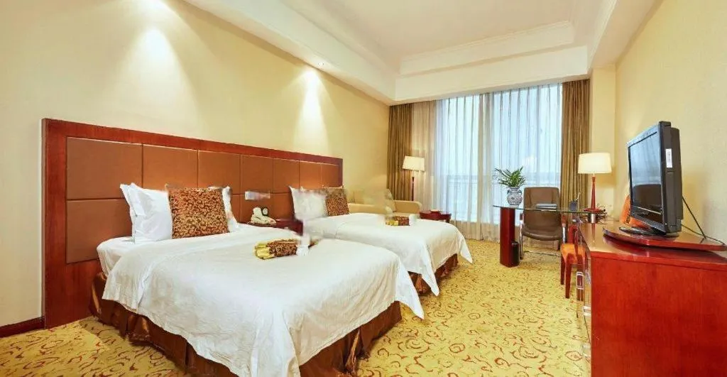 Bed in Qingdao Chengyang Detai Hotel