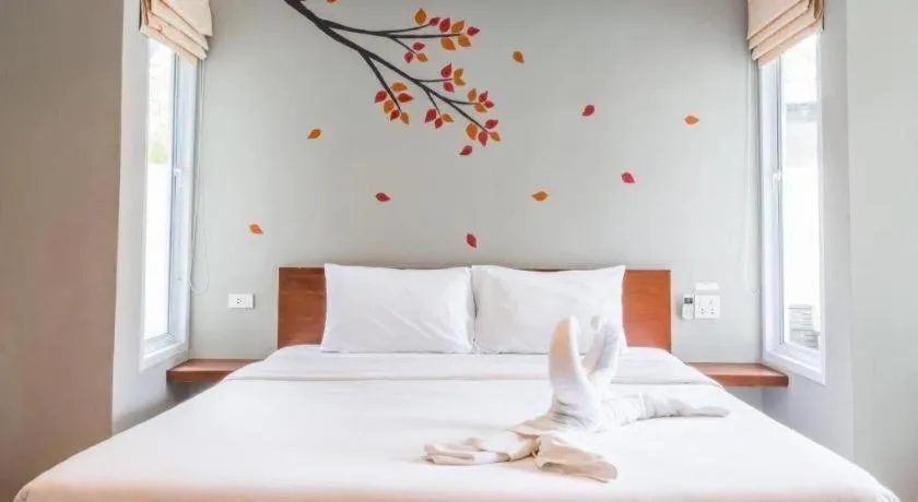 Bed in The Living Pool Villas