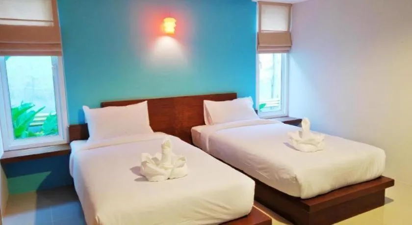 Bed in The Living Pool Villas