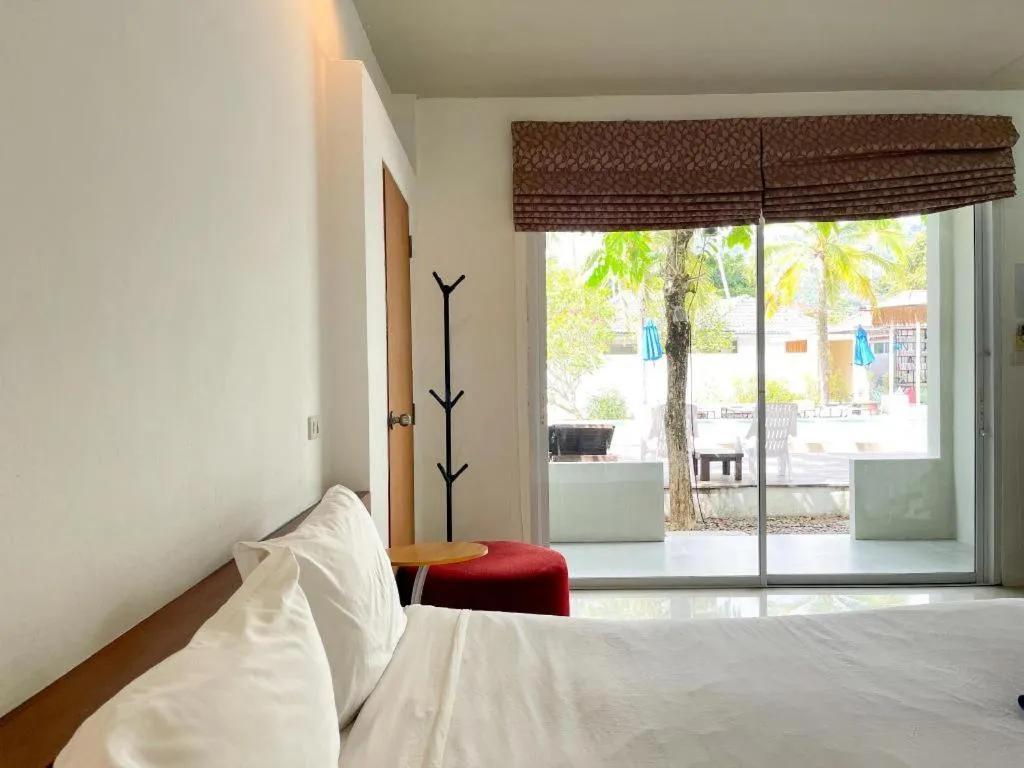 Bed in The Living Pool Villas