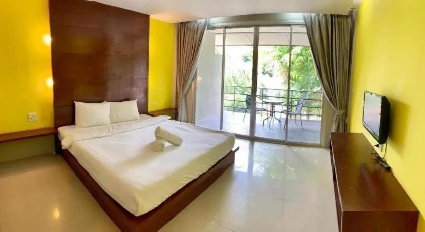 Bed in The Living Pool Villas