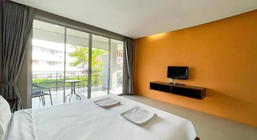 Bed in The Living Pool Villas