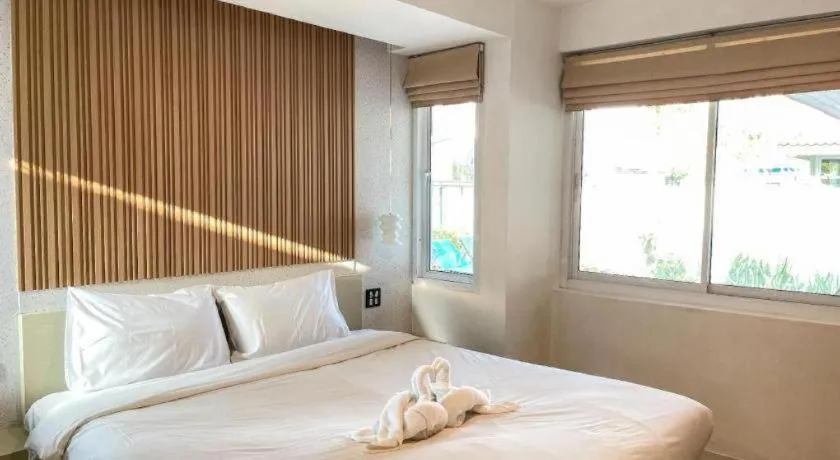 Bed in The Living Pool Villas