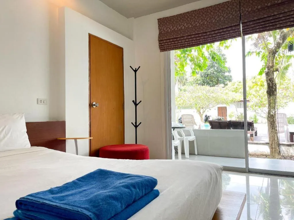 Bed in The Living Pool Villas