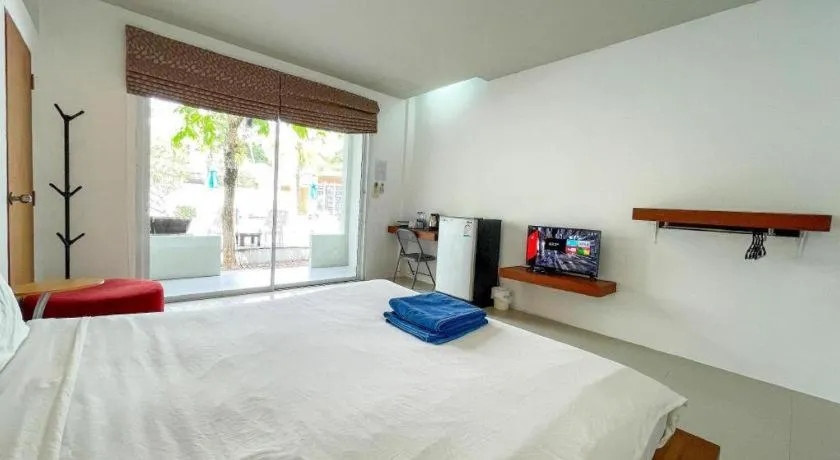 Bed in The Living Pool Villas