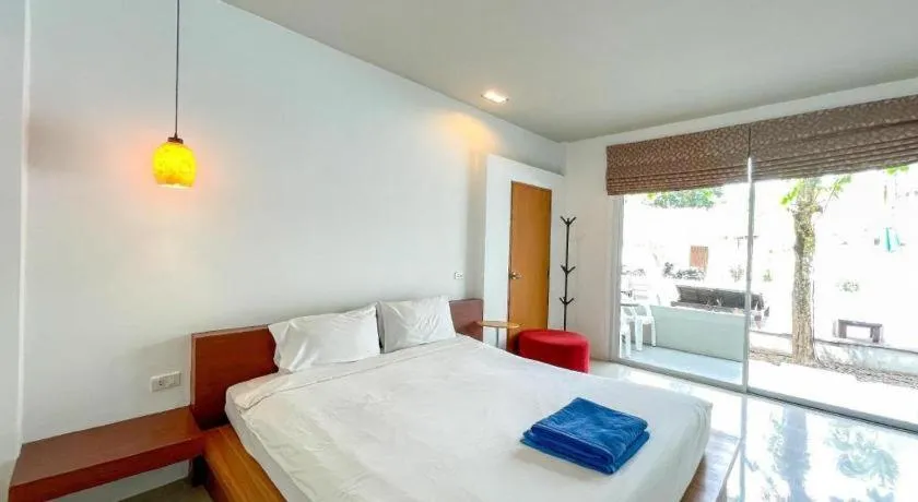 Bed in The Living Pool Villas