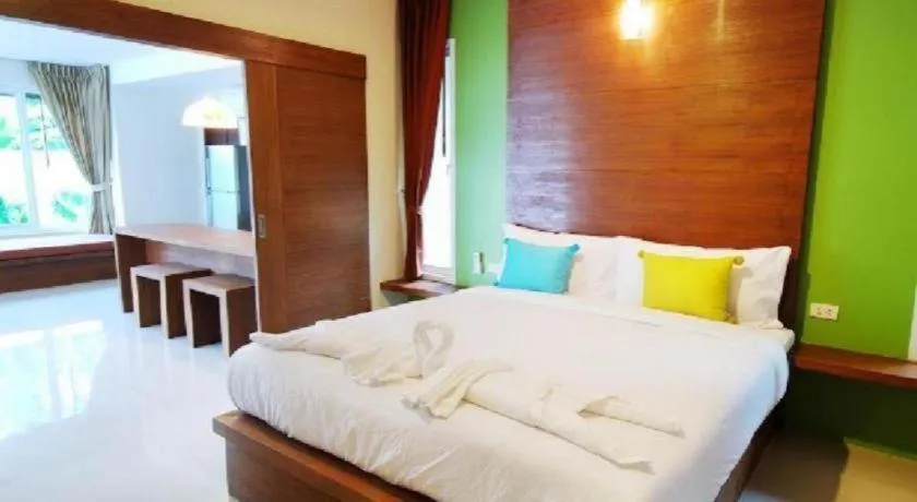 Bed in The Living Pool Villas