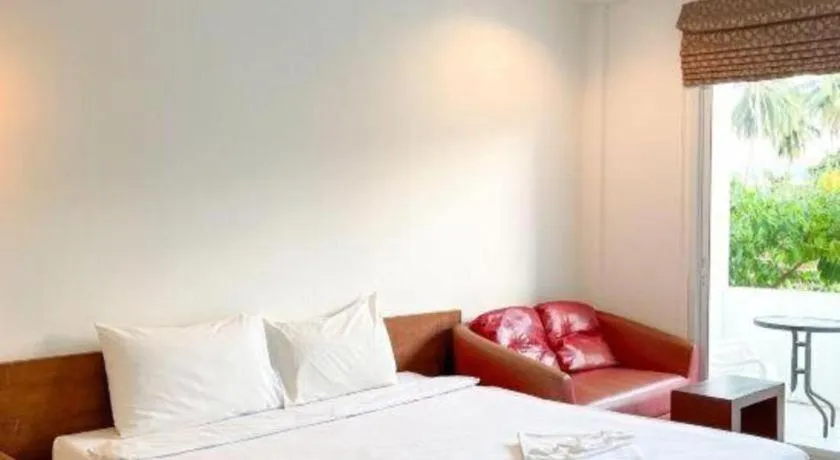 Bed in The Living Pool Villas