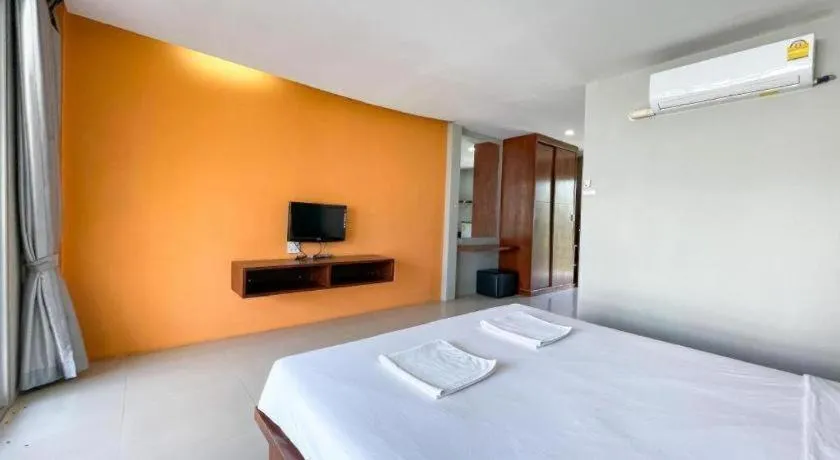 Bed in The Living Pool Villas