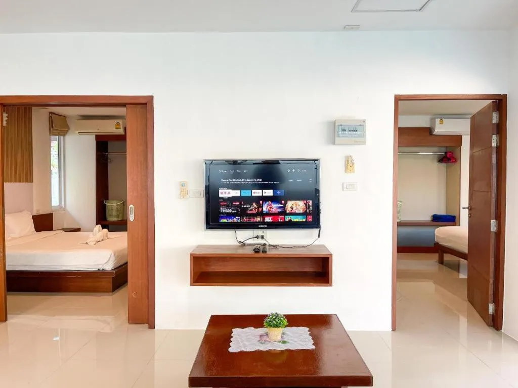 Bed in The Living Pool Villas