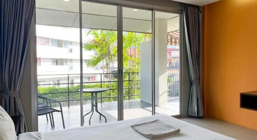 Bed in The Living Pool Villas