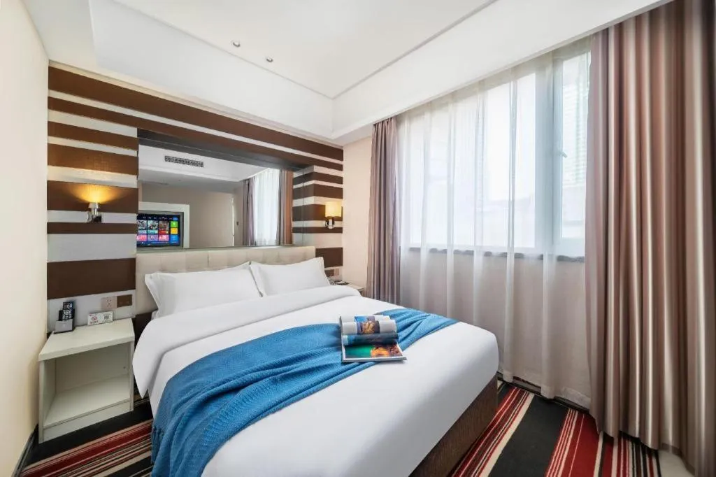 Bed in Urumqi Bayinhe Hotel