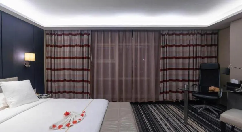 Bed in Urumqi Bayinhe Hotel